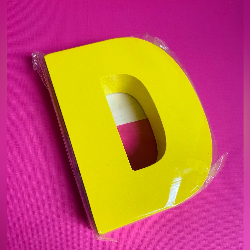 NWT. Block chunky wooden letter “D”. Bright yellow.